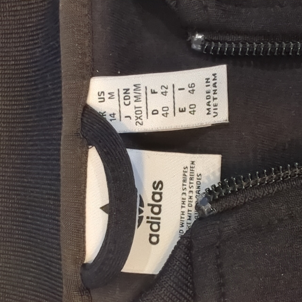 Adidas woman's black zip up jacket, size medium. - Picture 2 of 2